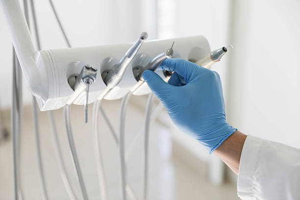 Professional Tooth Extraction technician working in Manassas Park, VA